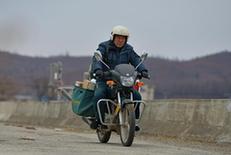 （图片故事）（1）乡邮员金仁哲的三十年坚守